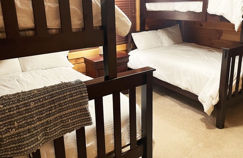 Houston House | Smith Lake Getaway: Lake front, custom log home with private dock and swim deck.