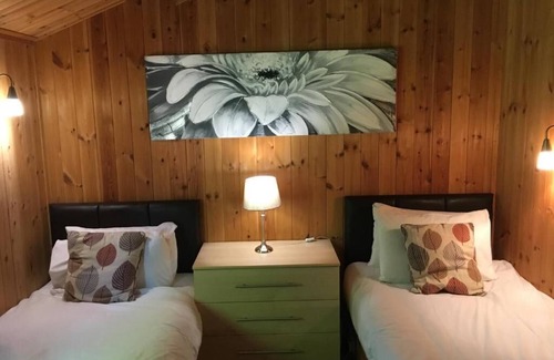 Llanybri House | Snowdrop 14 Hot tub-Woodlandlodges-Tenby-Pendine