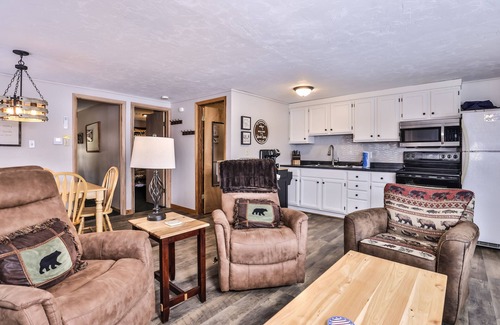 St Germain Cabin | Snowy lake-view cabin with fireplace, full kitchen, TV, dock, & DVD player