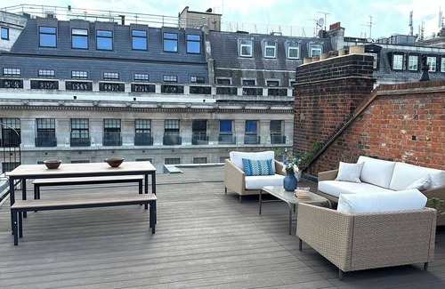 Fitzrovia Condo | Soak in the Spalike Marble Bath at Plush Penthouse