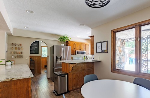 Fridley House | Soak, Relax & Gather - Spacious River Home - Hot Tub, Massage Chair & Kayaks