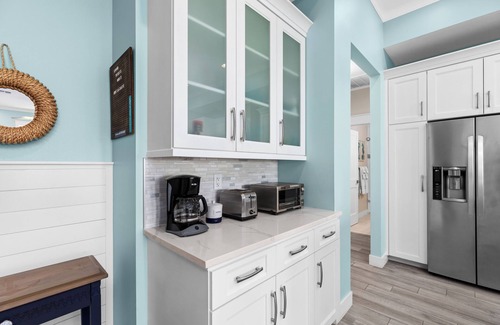 The Shores Cottage | Sol Y luna home at The Shores, sandy steps to the bay, short walk to the beach