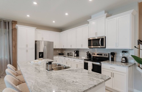 Davenport House | Solara Themed 6BR Near Disney Pool SummerKitchen