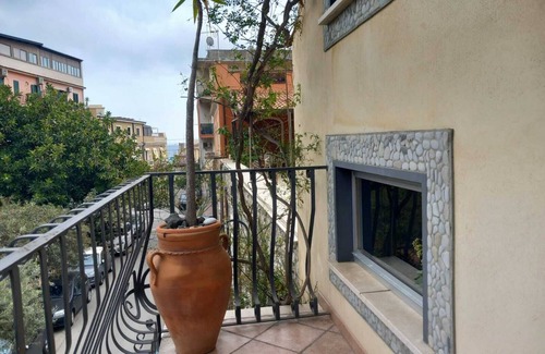 Villagonia Apartment | Sole Mare Giardini Naxos 'Family Room with View' with Balcony, Wi-Fi and Air Conditioning