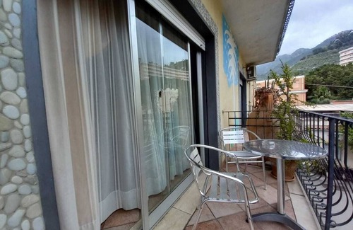 Villagonia Apartment | Sole Mare Giardini Naxos 'Family Room with View' with Balcony, Wi-Fi and Air Conditioning