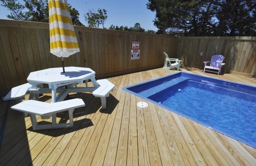 Ocracoke House | Solitude: Lavish, amenity filled! Relax in the pool, hot tub, theater