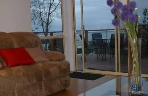 Somers Apartment | Somers Holiday accommodation with stunning balcony seaviews and private garden
