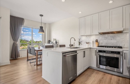 Bridgeland Apartment | Sophisticated 2 Bed, 2 Bath Condo with Abundant Natural Light in Bridgeland