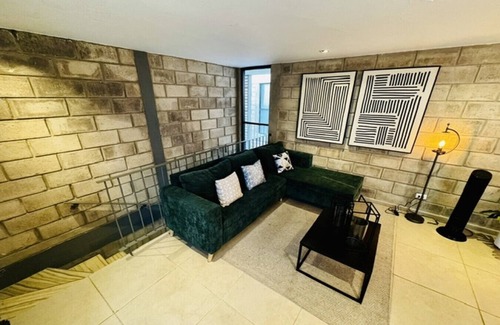 Downtown Guadalajara Apartment | Sophisticated Loft w/Gym & Dedicated Coworking Zone | 2 BD | Tribu Colón (304)