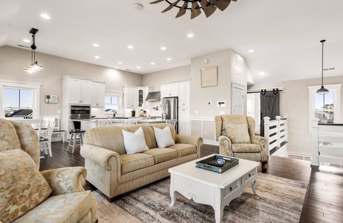 Nags Head House | Sound Living: Exquisite Canal-front home, Infinity Pool, Hot Tub, Elevator