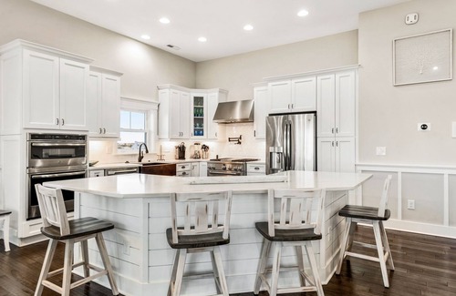 Nags Head House | Sound Living: Exquisite Canal-front home, Infinity Pool, Hot Tub, Elevator