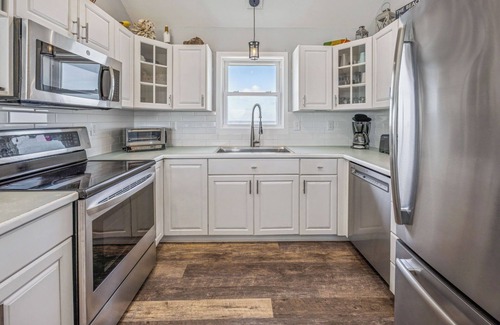 Frisco House | Soundfront Dog Friendly Home with Hot Tub, Game Room, Easy Windsports Access