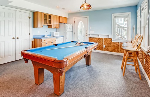 Wind Over Waves House | Soundside Home w/Pool, Hot Tub, Elevator, Game Room, Tiki Bar, and Much More!