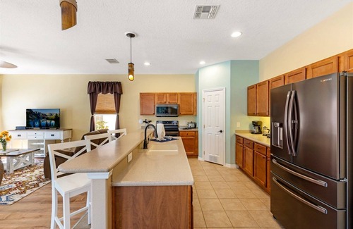 Watersong House | South facing heated pool and spa home in Watersong close to Disney attractions