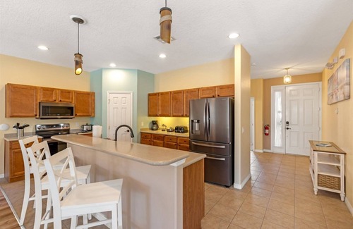 Watersong House | South facing heated pool and spa home in Watersong close to Disney attractions