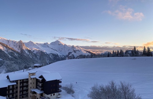 Manigod Apartment | South-facing mountain-view apartment with ski-in, ski-out convenience