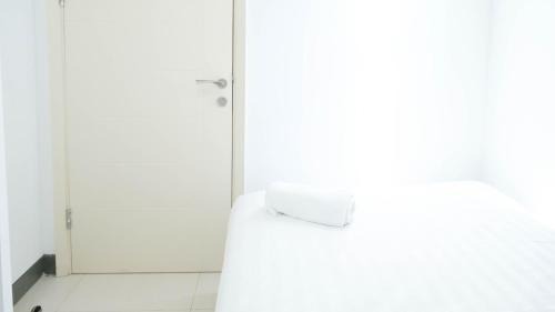 Surabaya Apartment | Spacey and Homey 2BR at Supermall Mansion Apartment By Travelio