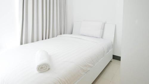 Surabaya Apartment | Spacey and Homey 2BR at Supermall Mansion Apartment By Travelio
