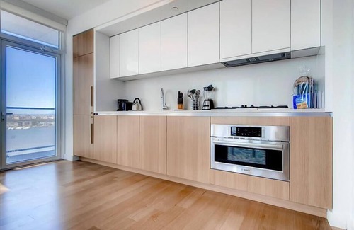 Hell's Kitchen Apartment | Spacious 1BR | Full Kitchen | Washer/Dryer | Balcony | by GLS