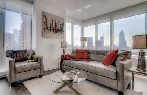 Hell's Kitchen Apartment | Spacious 1BR | Full Kitchen | Washer/Dryer | Balcony | by GLS