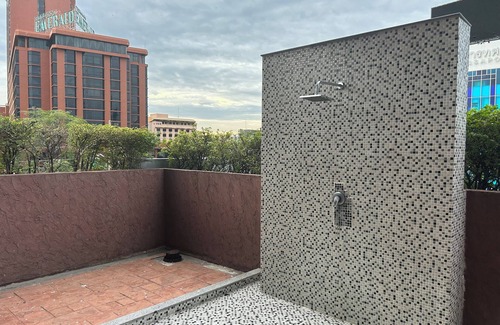 Ratchadaphisek Condo | Spacious 2-bedroom condo in welcoming Bangkok with WiFi, AC, fitness room