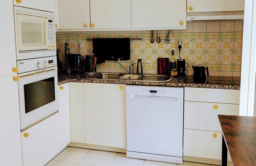 Santo Condestavel Apartment | Spacious 2-Bedroom Duplex with Private Roof Deck and Gym in Campo de Ourique