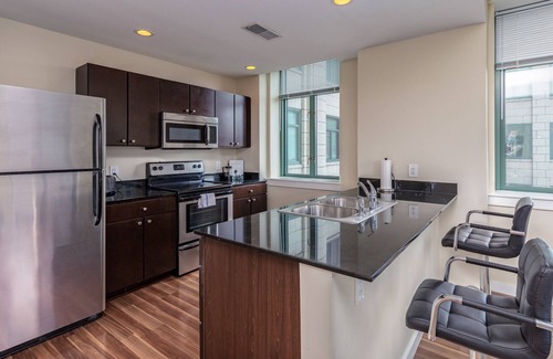 Downtown West Apartment | Spacious 2BR Near Arch, Dome, DT | Free Parking + Rooftop | Zencity