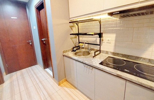 Surabaya Apartment | Spacious 2Br With Extra Room At Grand Sungkono Lagoon Apartment