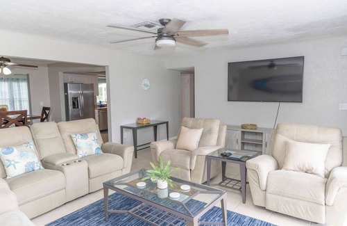 Oakland Hills House | Spacious 4/2 with heated pool and lake view FREE GOLF! Close to gulf beaches!