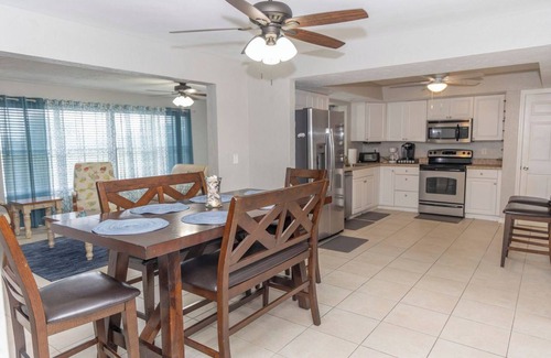 Oakland Hills House | Spacious 4/2 with heated pool and lake view FREE GOLF! Close to gulf beaches!