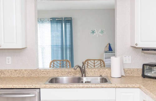 Oakland Hills House | Spacious 4/2 with heated pool and lake view FREE GOLF! Close to gulf beaches!