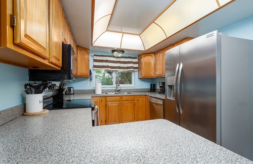 Clearwater House | Spacious 4 bedroom home ~ 2 King beds, heated pool, 15 mins to Clearwater Beach