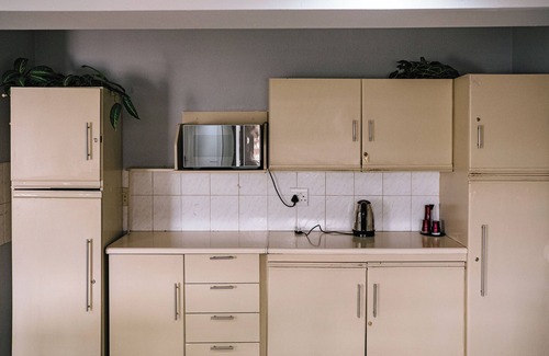 Germiston House | Spacious 4-bedroom house in tranquil Germiston with WiFi