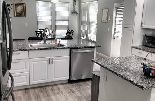 Lilburn House | Spacious 4-bedroom home with WiFi, AC/heat, and BBQ- grill in charming Lilburn.