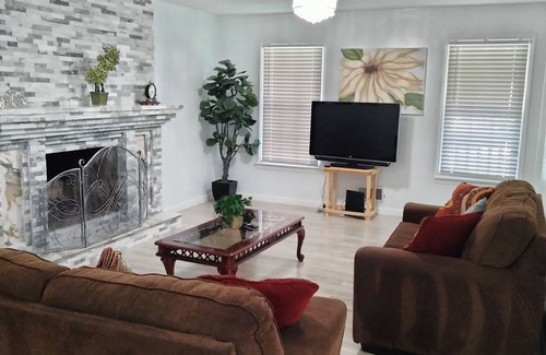 Lilburn House | Spacious 4-bedroom home with WiFi, AC/heat, and BBQ- grill in charming Lilburn.