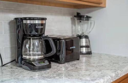 Shelbyville House | Spacious 4-bedroom house on Gun Lake with private hot tub.