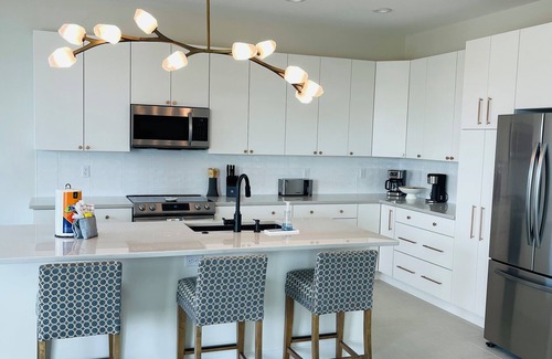 South Island House | Spacious 5-bedroom house w/Elevator, Canal, and heated pool Fort Myers Beach