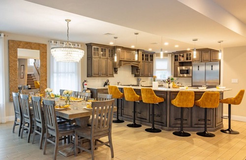 A-Zone Villa | Spacious 6 Bed 5 Bath Beach Home with Elevator, Pool & Decks Steps from the Beach