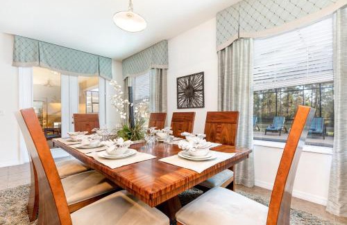 Watersong Villa | Spacious 6-Bedroom Getaway with Game Room, Private Spa & Sunny Pool Deck in Premier Resort Setting
