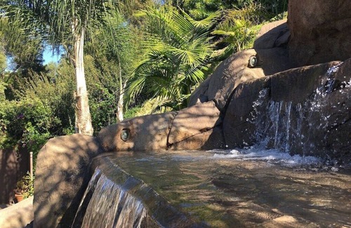 North Pacific Beach House | Spacious 6 Bedroom Vacation Home with Waterslide & Heated Saltwater Pool