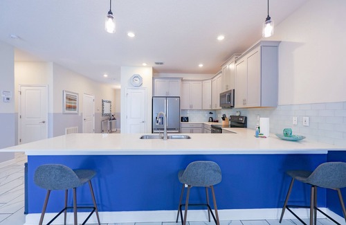 Davenport Villa | Spacious 8-bedroom villa in Championsgate, Private Pool, Water Park,Clubhouse