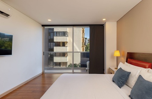 El Castillo Apartment | Spacious and Airy 1BR unit next to Golden Mile with A/C and gym