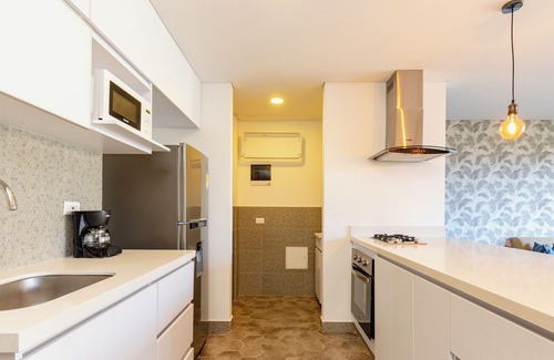El Castillo Apartment | Spacious and Airy 1BR unit next to Golden Mile with A/C and gym