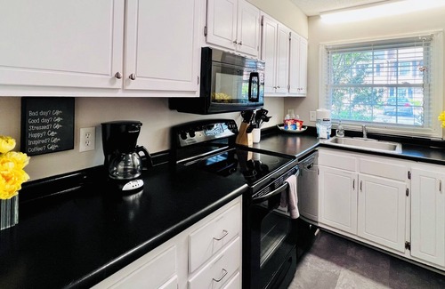Golden Mile House | Spacious and Central Family/Pet Friendly Townhome with Pool, Half Mile to Beach!