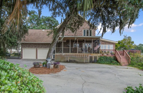 North Charleston House | Spacious and inviting riverview home with a private pool, screened porch