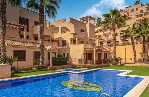 Los Geraeos Apartment | Spacious and practical vacation apartment in a gated community with communal pools.
