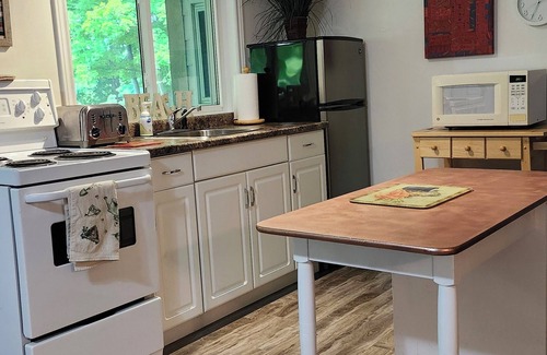Southampton House | Spacious Apartment across from Golf Course/Patio overlooking Parklike Backyard