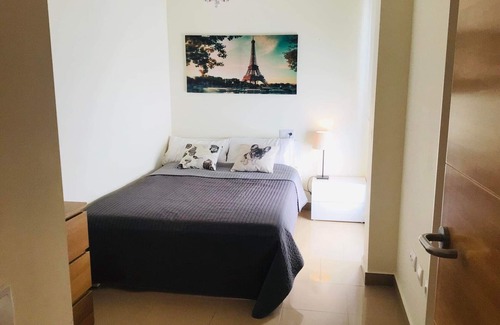 Gran Tarajal Apartment | Spacious Apartment, Panoramic Sea and Mountain Views, Gym, Pool, WiFi, Smart TV