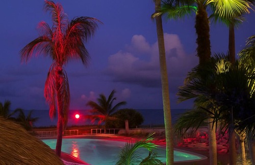 Bermuda Riviera Condo | Spacious Beach Retreat - Private Beach - Pool & Tiki - Ping Pong & Hockey Table