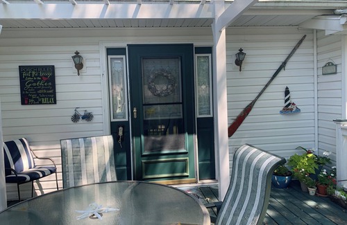 Port Austin House | Spacious beachfront Cape Cod lakehouse in Port Austin/Caseville Sleeps 12